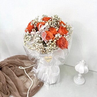 Tangerine rose and baby breath